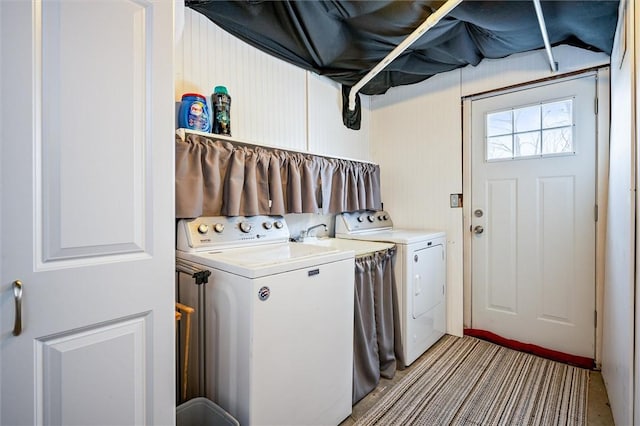 laundry room featuring washer and clothes dryer