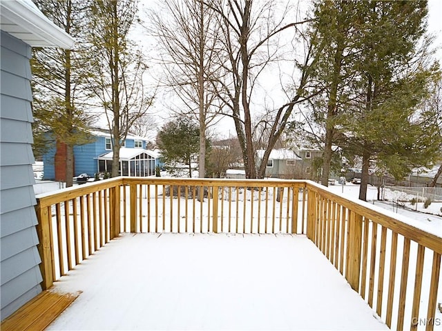 view of snow covered deck