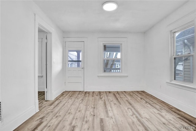 entrance foyer with light hardwood / wood-style floors