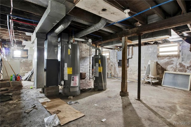 basement with water heater, heating unit, and electric panel