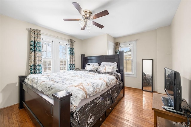 bedroom featuring ceiling fan and hardwood / wood-style floors