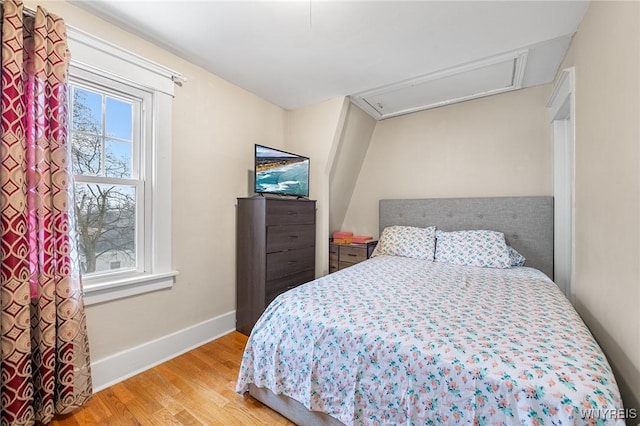 bedroom featuring light wood-type flooring