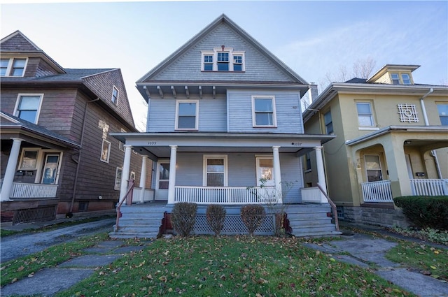 view of front of property featuring covered porch