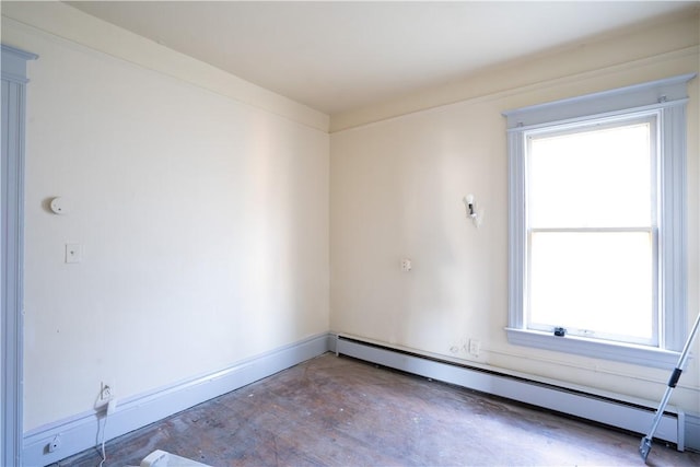 empty room featuring baseboard heating