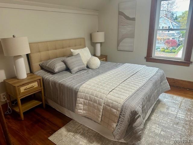 bedroom featuring wood-type flooring