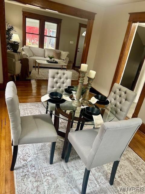 dining room with hardwood / wood-style floors