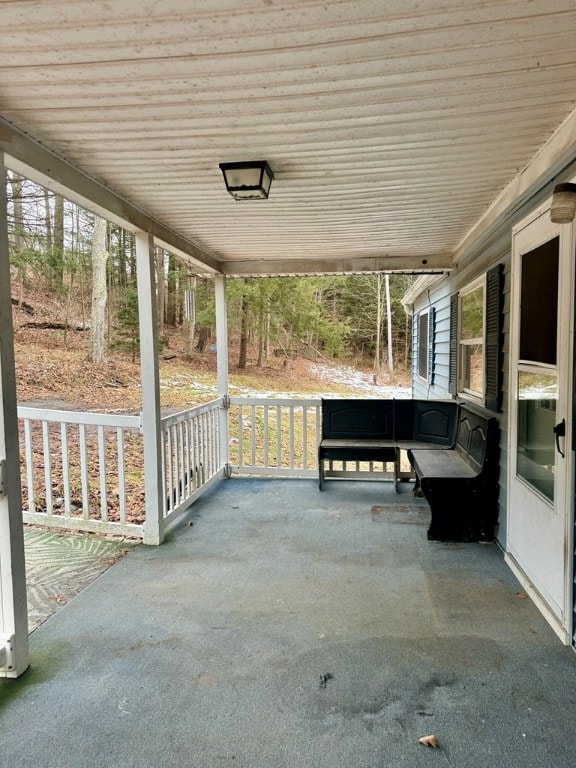 view of patio featuring a porch