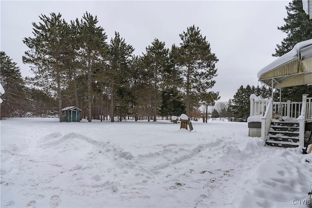 view of yard layered in snow