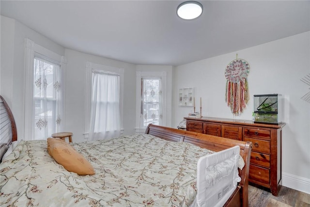 bedroom featuring wood-type flooring