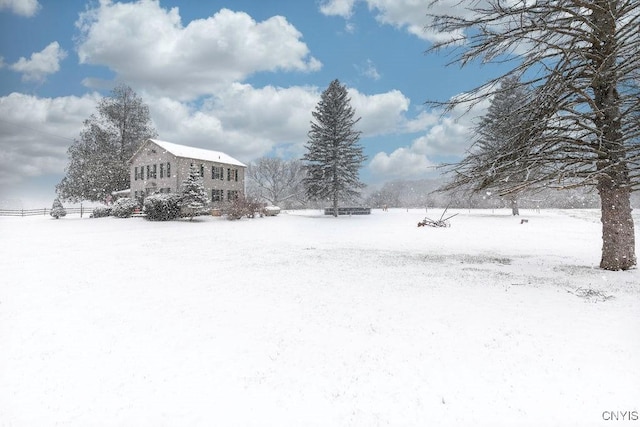 view of yard covered in snow