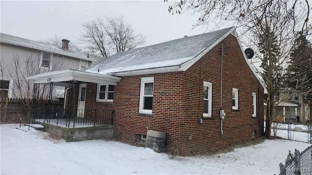 view of snow covered property