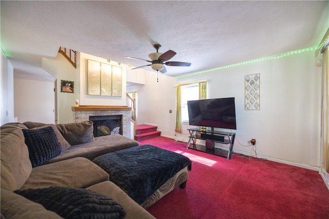 carpeted living room featuring ceiling fan, a brick fireplace, and a textured ceiling