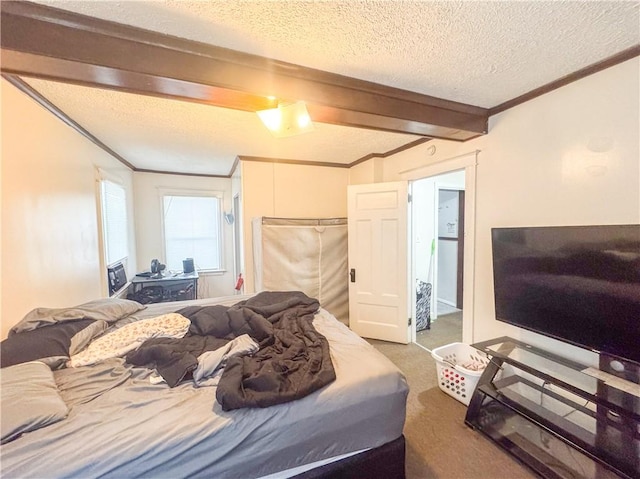 carpeted bedroom featuring beam ceiling, ornamental molding, and a textured ceiling