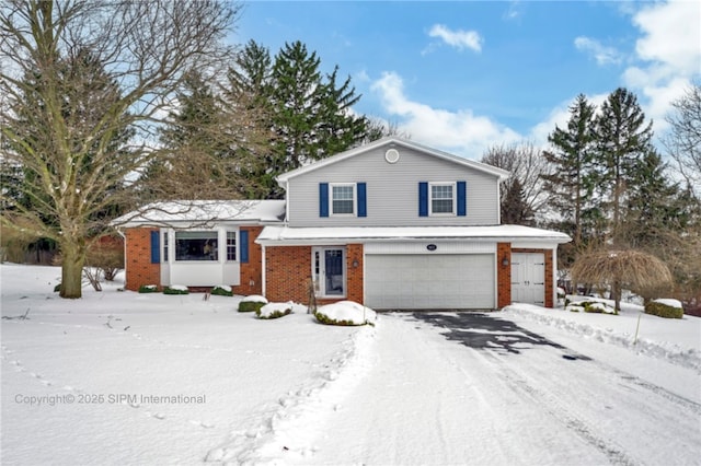 view of front of home with a garage