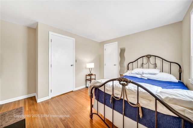 bedroom featuring hardwood / wood-style flooring