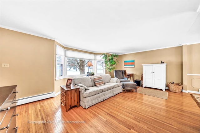 living room featuring crown molding, baseboard heating, and light hardwood / wood-style floors