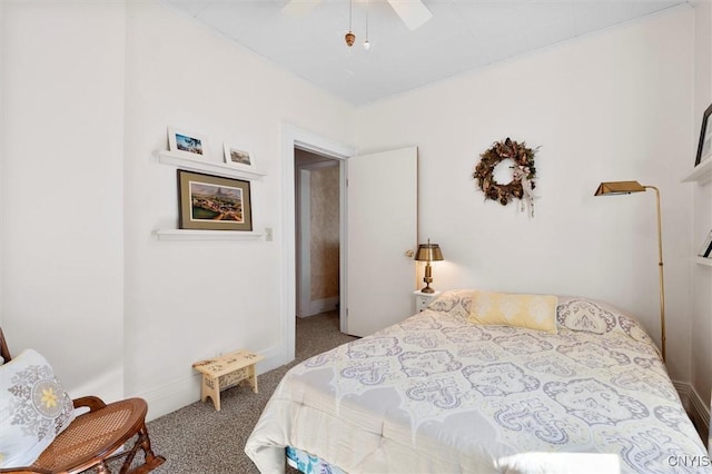 bedroom featuring ceiling fan and carpet floors