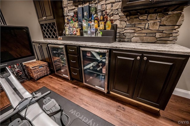 1771 Independence, Utica, NY 13502 - bar with a bar, wine cooler, and wood finished floors