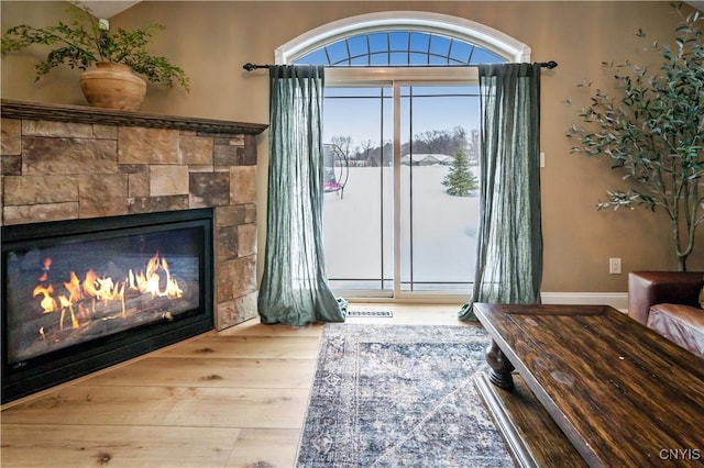 1771 Independence, Utica, NY 13502 - interior space featuring wood finished floors and a glass covered fireplace
