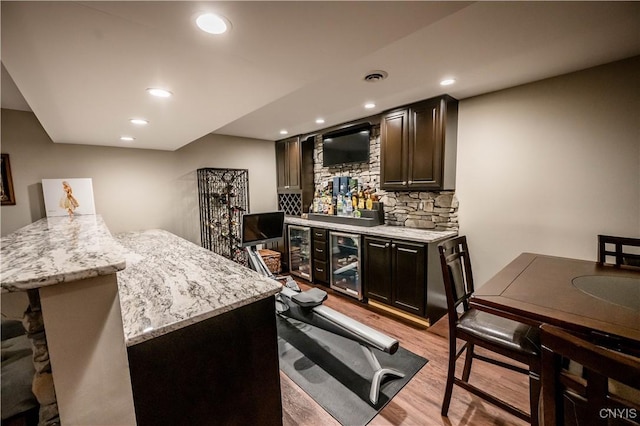 1771 Independence, Utica, NY 13502 - bar featuring light wood-style flooring, a dry bar, beverage cooler, and recessed lighting