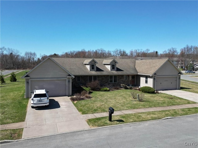 1771 Independence, Utica, NY 13502 - view of front of house with concrete driveway, a front yard, and stone siding