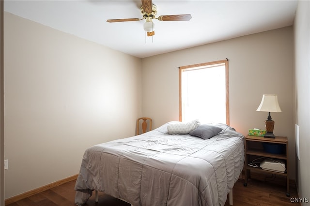 bedroom featuring hardwood / wood-style flooring and ceiling fan