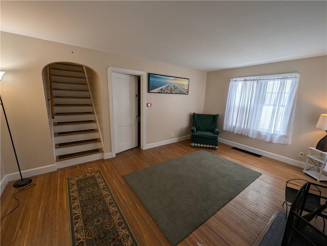 sitting room featuring hardwood / wood-style flooring