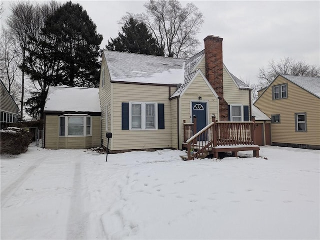 view of snow covered house