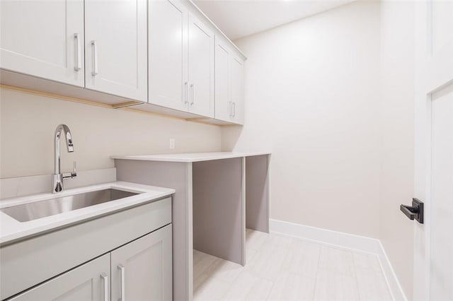 laundry area featuring sink