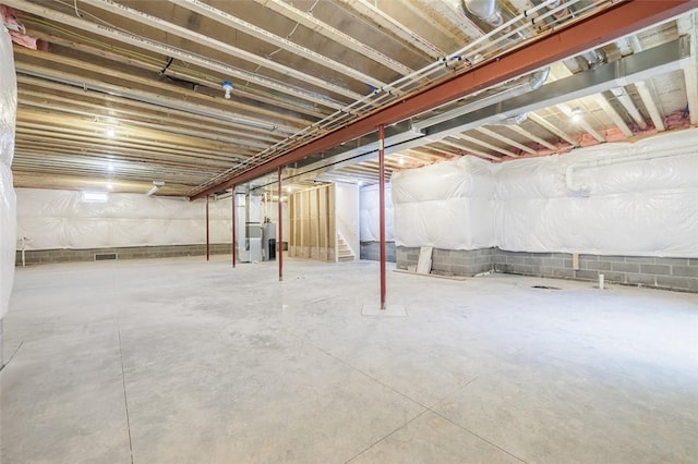 basement featuring water heater