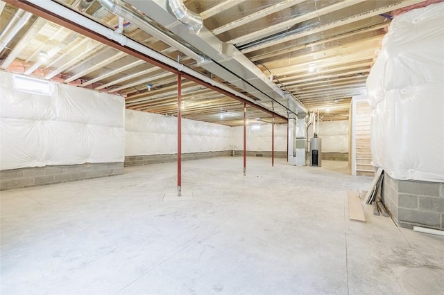 basement featuring water heater