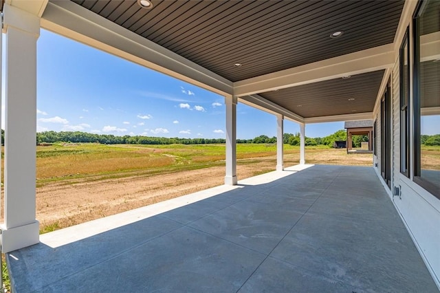 view of patio / terrace featuring a rural view