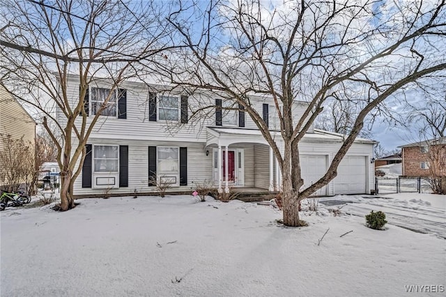 view of front of property featuring a garage