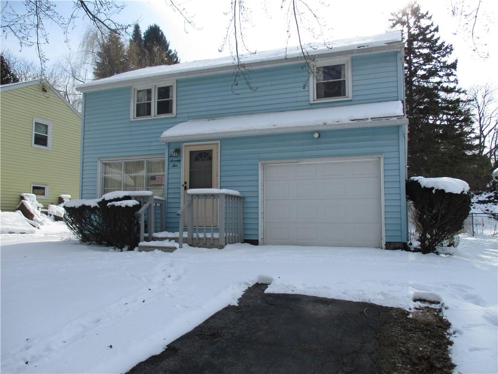 view of property featuring a garage