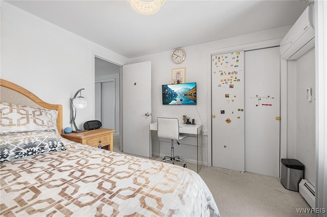 carpeted bedroom with a baseboard heating unit and a wall mounted AC