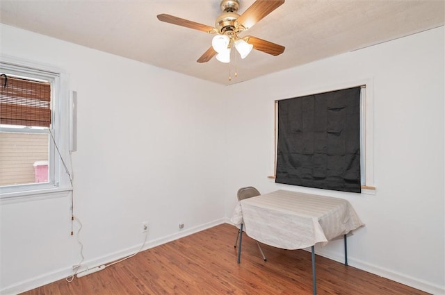 interior space with hardwood / wood-style floors and ceiling fan