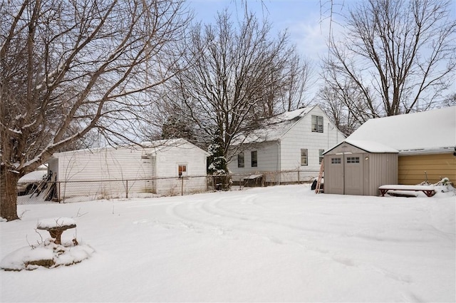 view of yard covered in snow