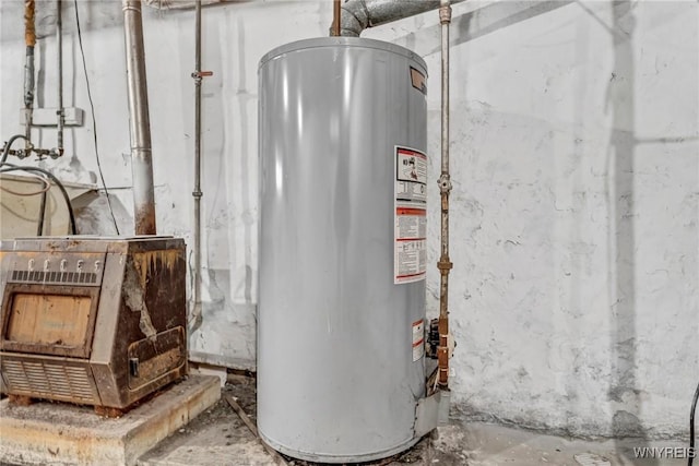 utility room with gas water heater