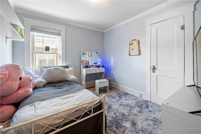 bedroom featuring crown molding