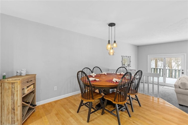 dining room with light wood-type flooring