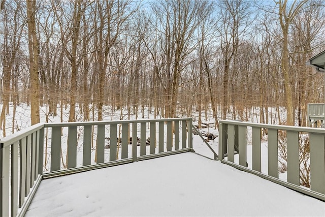 view of snow covered deck