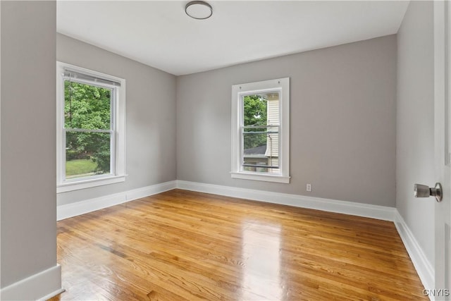 empty room featuring hardwood / wood-style flooring