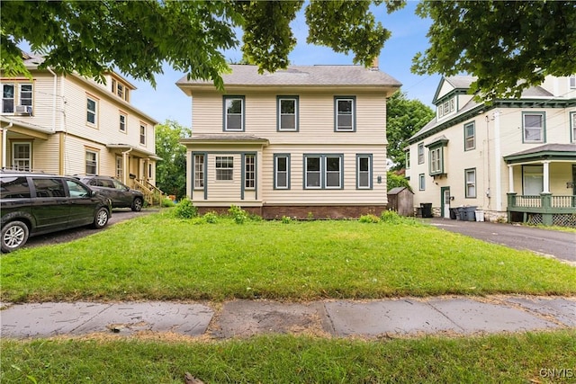 view of front facade featuring a front yard