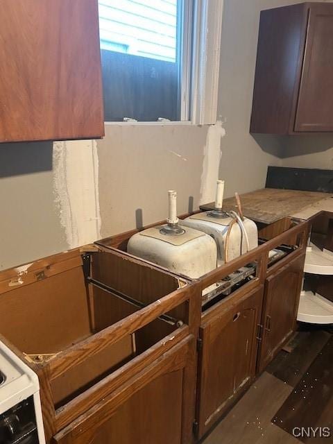 kitchen with dark brown cabinetry