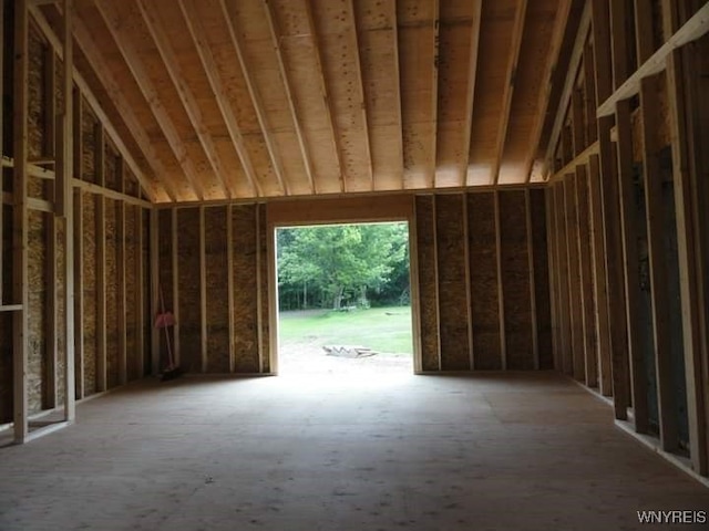 misc room with lofted ceiling