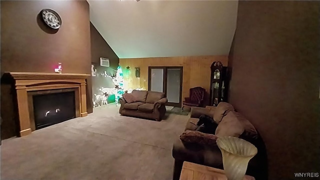 living room with carpet floors and lofted ceiling