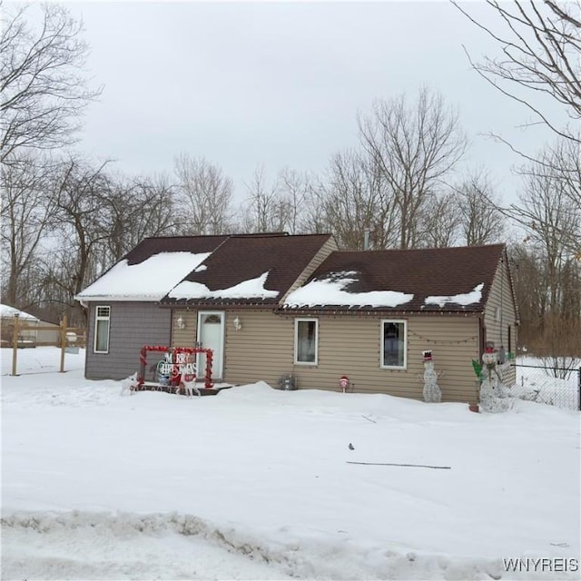 view of snow covered house