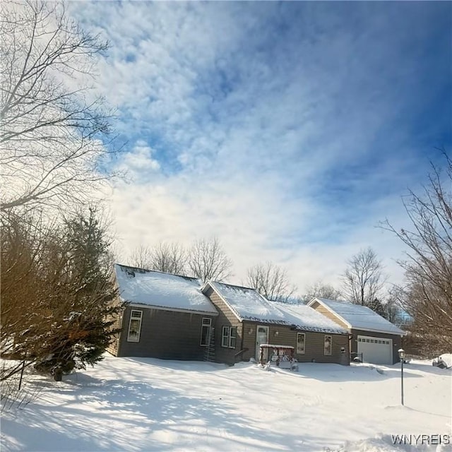 view of front of home with a garage