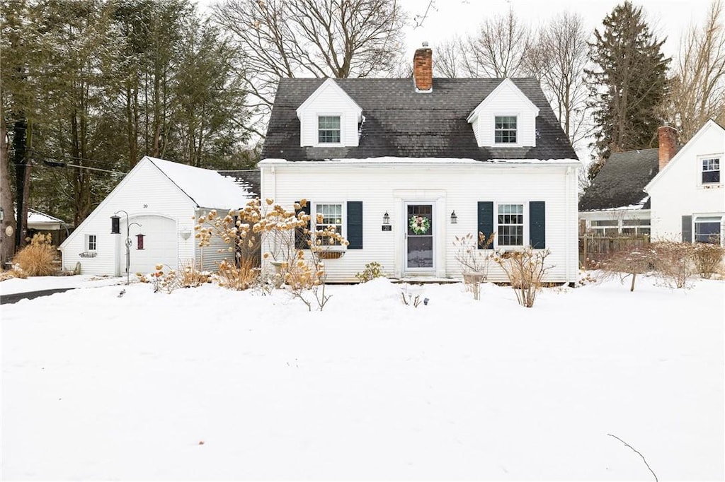 view of new england style home