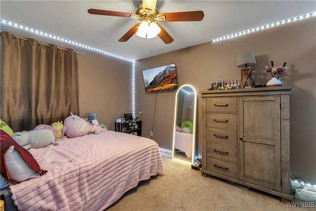 bedroom featuring light carpet and ceiling fan